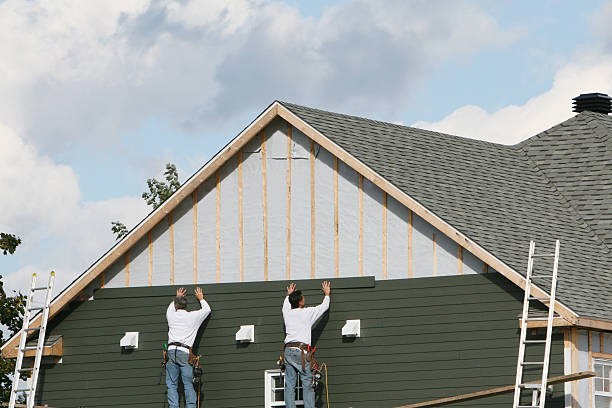 Professional Storm Damage Siding Repair technician working in Cockeysville, MD